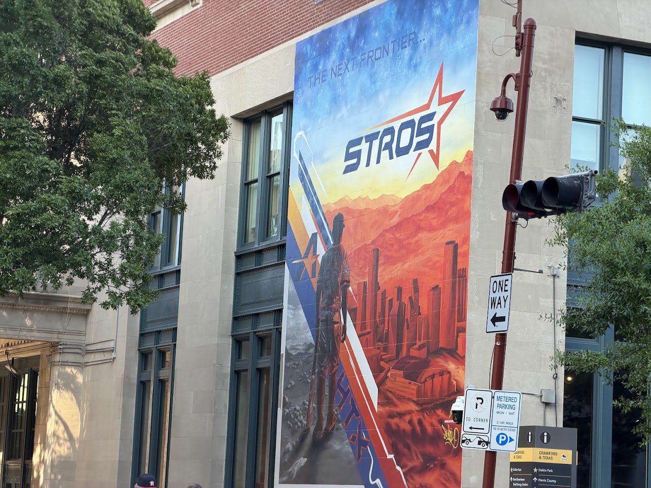Astros banner hangs outside Daikin Park in Houston, Texas, on Opening Weekend.