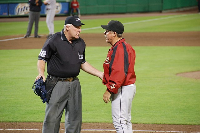 Phil Garner argues with the umpire on calling a balk.