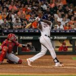 Yordan Alvarez of the Houston Astros watches the baseball sail away.