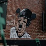 A mural depicts a player for the Colorado Rockies baseball team.
