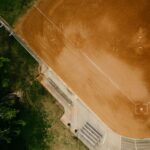 An image of half of an empty baseball diamond.