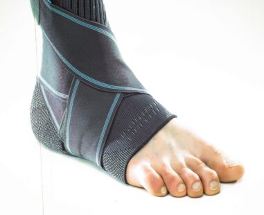A right foor wrapped in bandages.