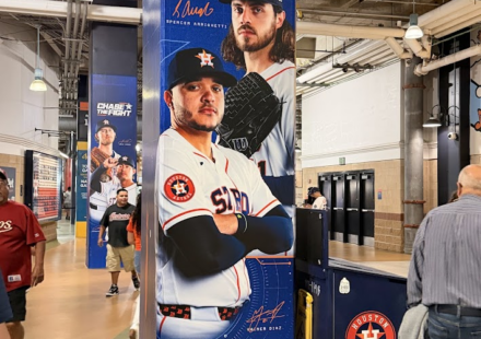 A banner at Daikin Park with the Astros' 2026 slogan, "Chase the Fight", on it.