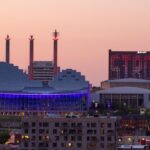 Kauffman Stadium, where the Royals play, stands out against the skyline at dusk.