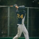 A batter after taking a swing at the ball.