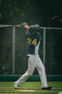 A batter after taking a swing at the ball.