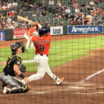 Christian Walker lets his bat fly at home plate.