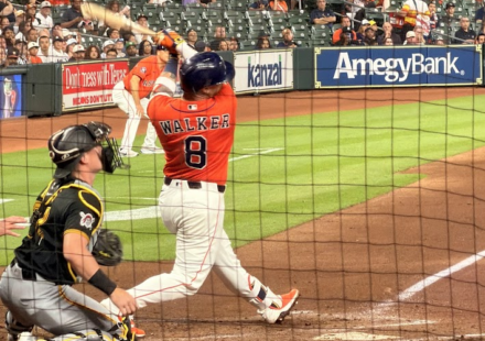 Christian Walker lets his bat fly at home plate.