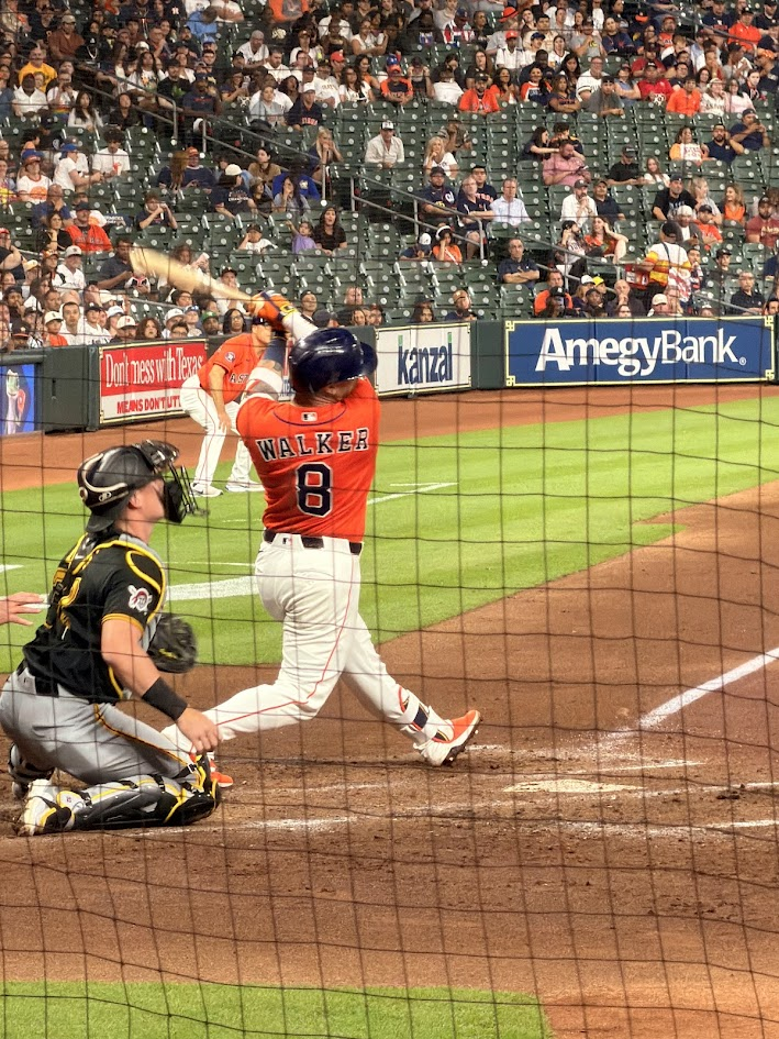 Christian Walker lets his bat fly at home plate.