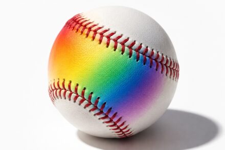 White baseball illuminated with a rainbow gradient on a white background for Astros Pride Night.