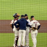 A conference on the pitcher's mound at Daikin Park.