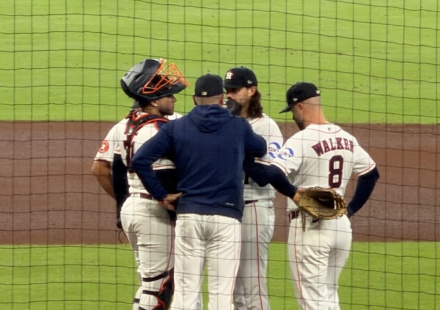 A conference on the pitcher's mound at Daikin Park.