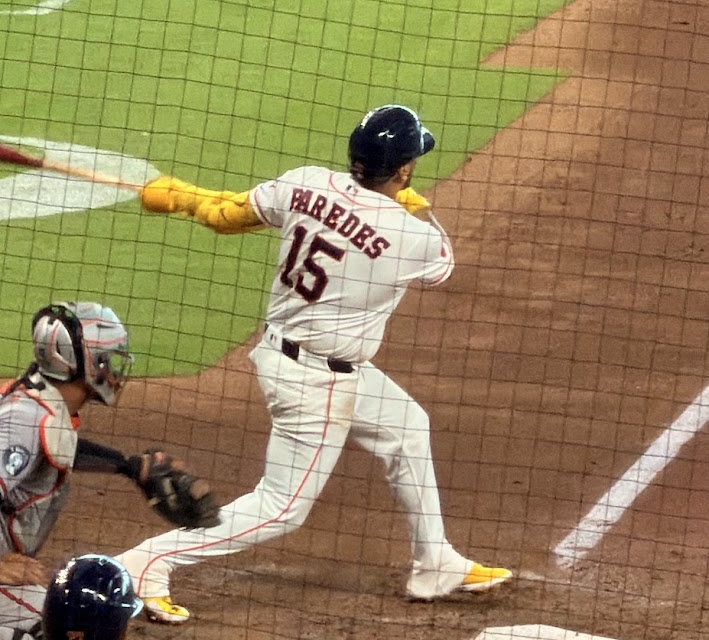 Isaac Paredes lets fly with his bat at Daikin Park.