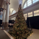 A large, decorated Christmas tree lights up Daikin Park.