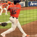 Isaac Paredes swings away at home plate.