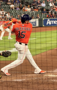 Isaac Paredes swings away at home plate.