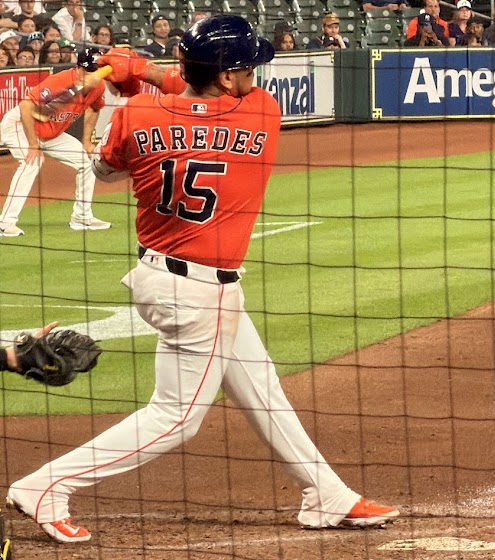 Isaac Paredes swings away at home plate.