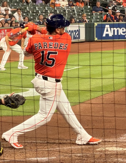 Isaac Paredes swings away at home plate.