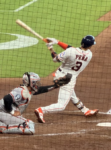 Jeremy Peña follows through after a swing at the ball.
