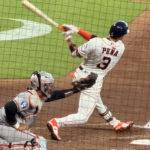 Jeremy Peña follows through after a swing at the ball.
