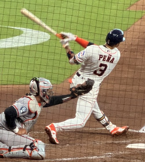 Jeremy Peña follows through after a swing at the ball.