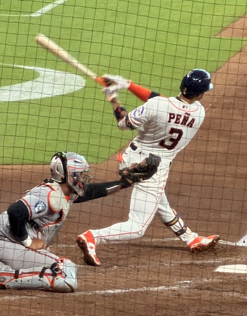 Jeremy Peña follows through after a swing at the ball.