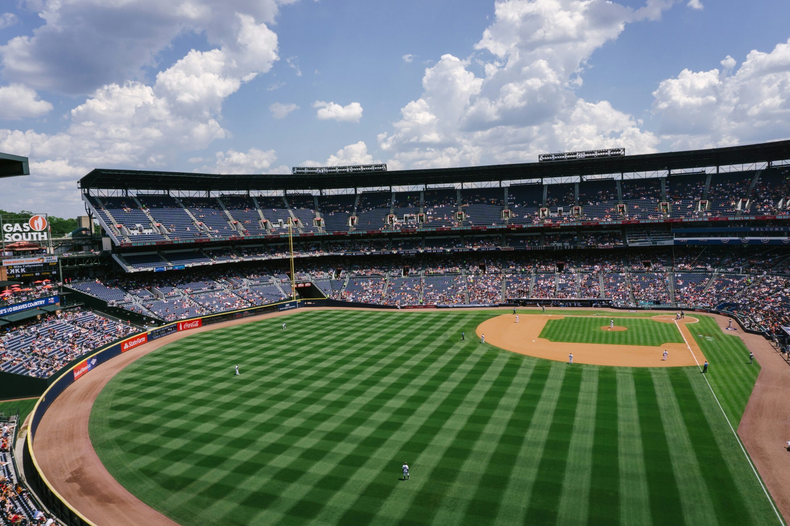 View of a baseball stadium from behind second base.