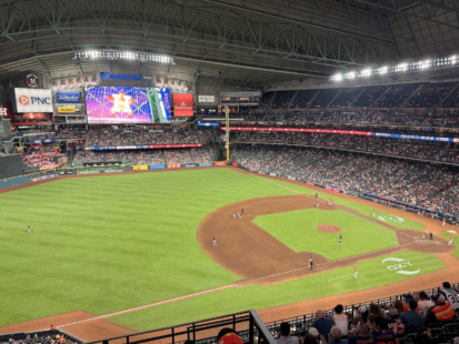 The Astros are on the field at Daikin Park.