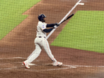 Yordan Alvarez swings the bat at Daikin Park.