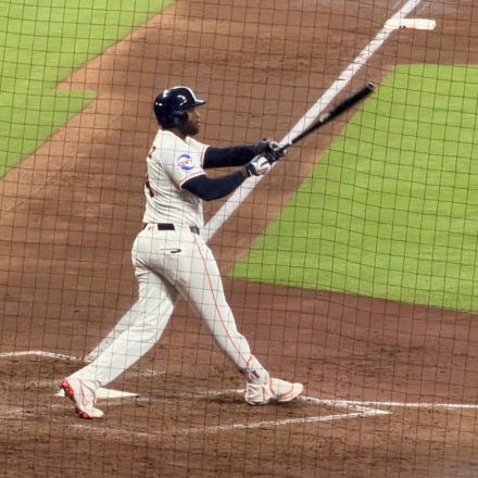 Yordan Alvarez swings the bat at Daikin Park.