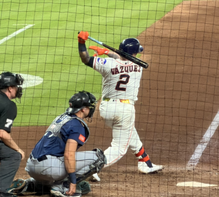 Houston Astros catcher Christian Vázquez follows through on a swing against the Seattle Mariners at Daikin Park.