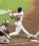 Cam Smitth takes a swing at the ball.