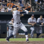 Carlos Correa swings away for the Houston Astros.