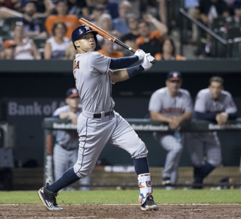 Carlos Correa swings away for the Houston Astros.