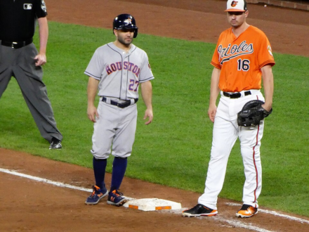 Trey Mancini of the Baltimore Orioles stands at first base alongside Houston Astros second baseman Jose Altuve during a 2018 game at Camden Yards.
