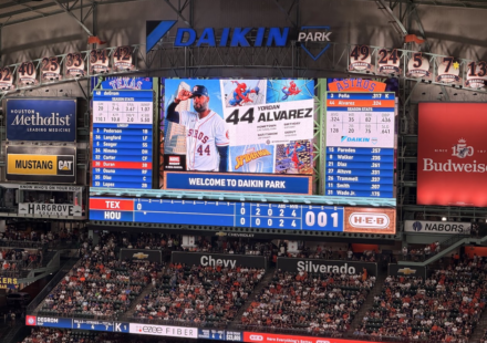 Daikin Park scoreboard displays Yordan Alvarez's Marvel Night graphic during an Astros game against the Rangers.