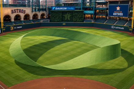 A giant Möbius strip loops across the outfield at Daikin Park.