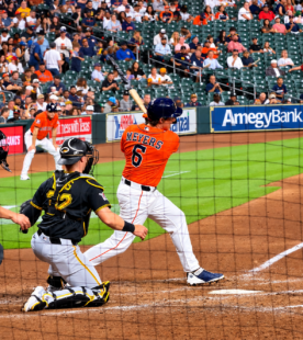 Jake Meyers swings at a pitch for the Astros at Daikin Park.