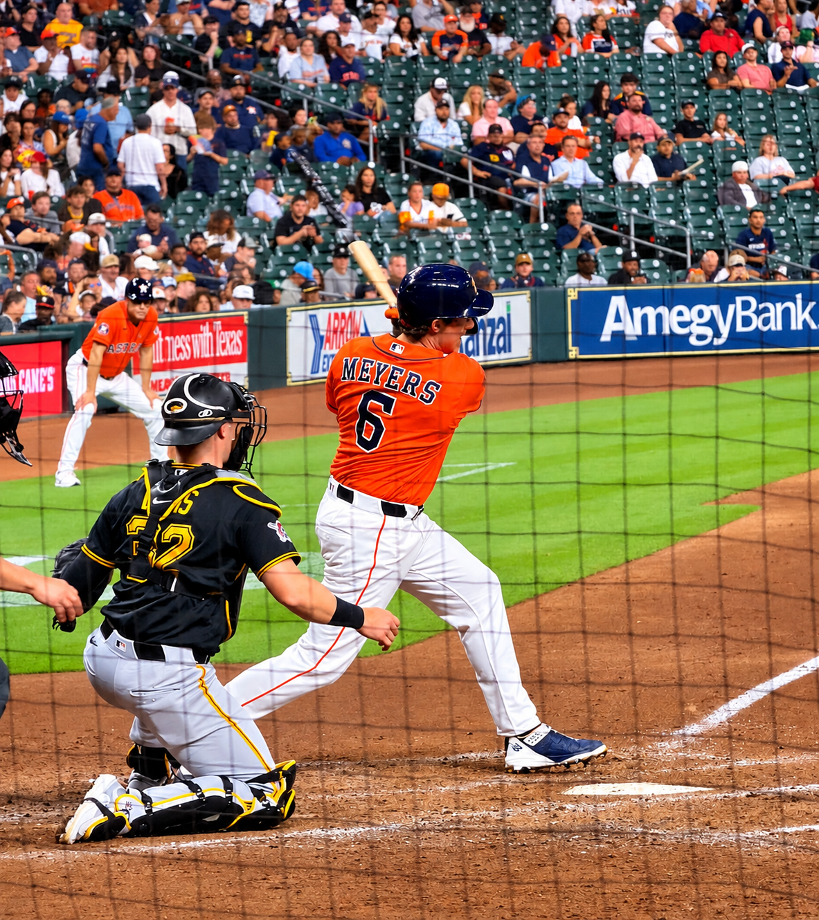 Jake Meyers swings at a pitch for the Astros at Daikin Park.