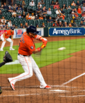 Isaac Paredes follows through on a swing at Daikin Park.