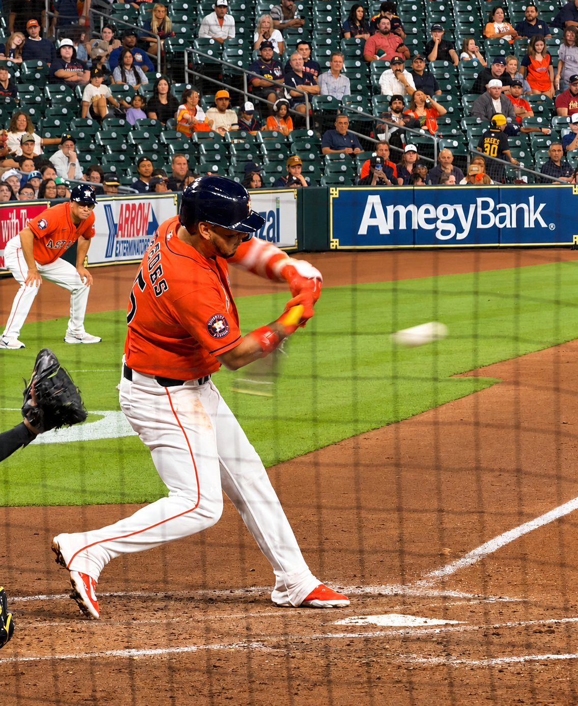 Isaac Paredes follows through on a swing at Daikin Park.