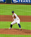 Bryan Abreu winding up for a pitch against the Atlanta Braves at Daikin Park.