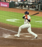 Yainer Diaz swings at a pitch during the Astros-Braves game at Daikin Park.