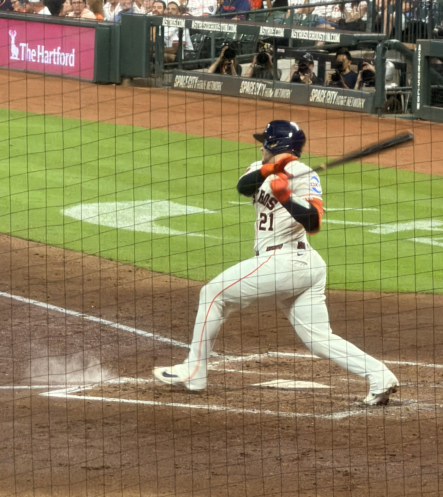 Yainer Diaz swings at a pitch during the Astros-Braves game at Daikin Park.