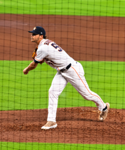 Josh Hader delivers a pitch for the Astros at Daikin Park.