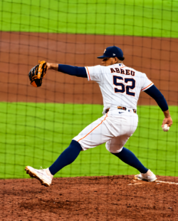 Bryan Abreu delivers a pitch for the Astros at Daikin Park.