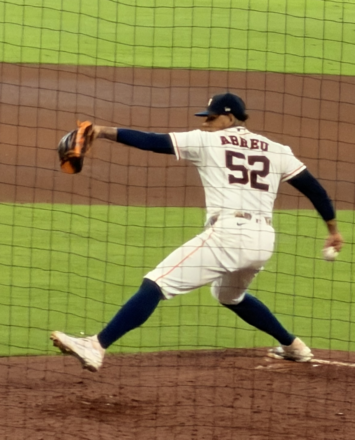 Bryan Abreu delivers a pitch for the Astros at Daikin Park.