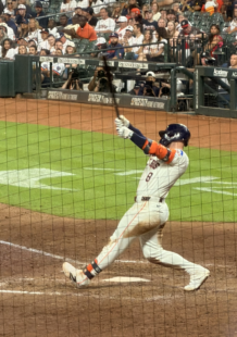 Christian Walker swings at a pitch during an Astros game at Daikin Park.