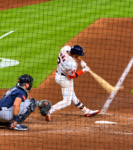 Jeremy Peña makes contact at the plate at Daikin Park.