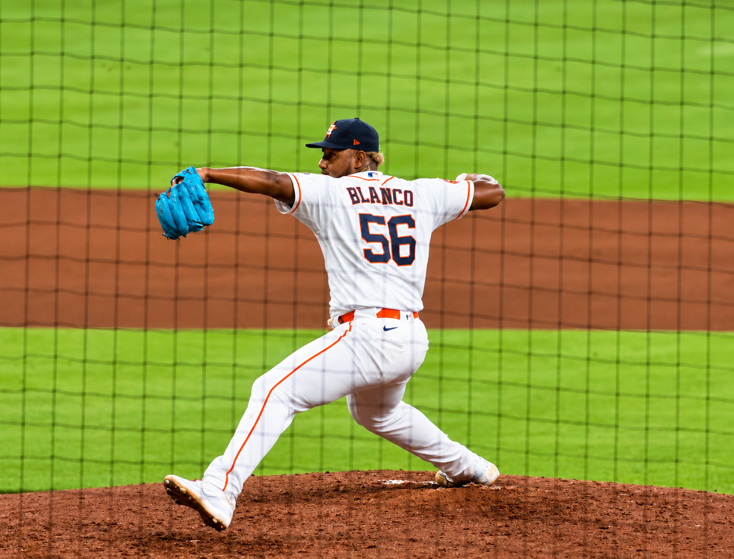 Houston Astros pitcher Ronel Blanco winds up for a pitch at Daikin Park.